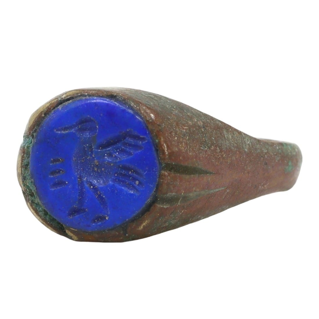 An Ancient Sasanian Lapis Lazuli Stamp Seal Ring, c. 224-651 AD: This exquisite stamp seal ring, made from rich cobalt lapis lazuli, dates back to the Sasanian period (c. 224-651 AD). It exemplifies the intricate craftsmanship and cultural significance of the era, 