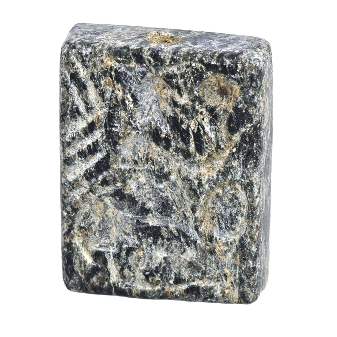 An Ancient Achaemenid Diorite Double Convex, c. 550-330 BCE: This exquisite double convex, made from dark greenish-black diorite, dates back to the Achaemenid period (c. 550-330 BCE). It exemplifies the meticulous craftsmanship and sophisticated artistry charac