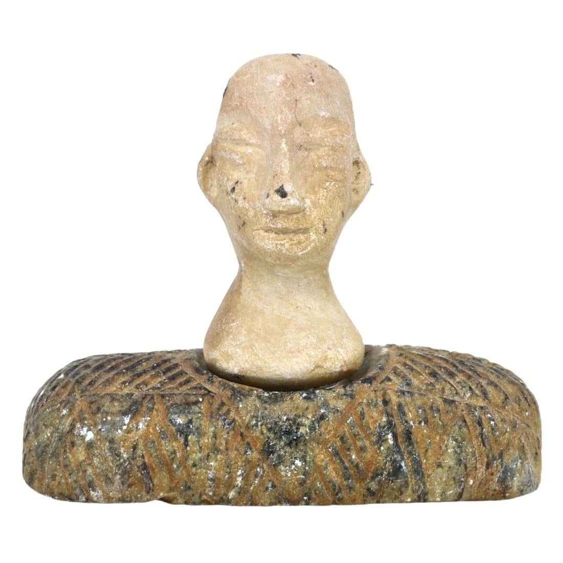 An Ancient Bactria-Margiana Steatite and Limestone Idol, c. 2300-1700 BCE: Category: Figurines and Statuettes Originating from the Bactria-Margiana Archaeological Complex, this idol combines steatite and limestone, materials cherished for their durability and aesthetic appea