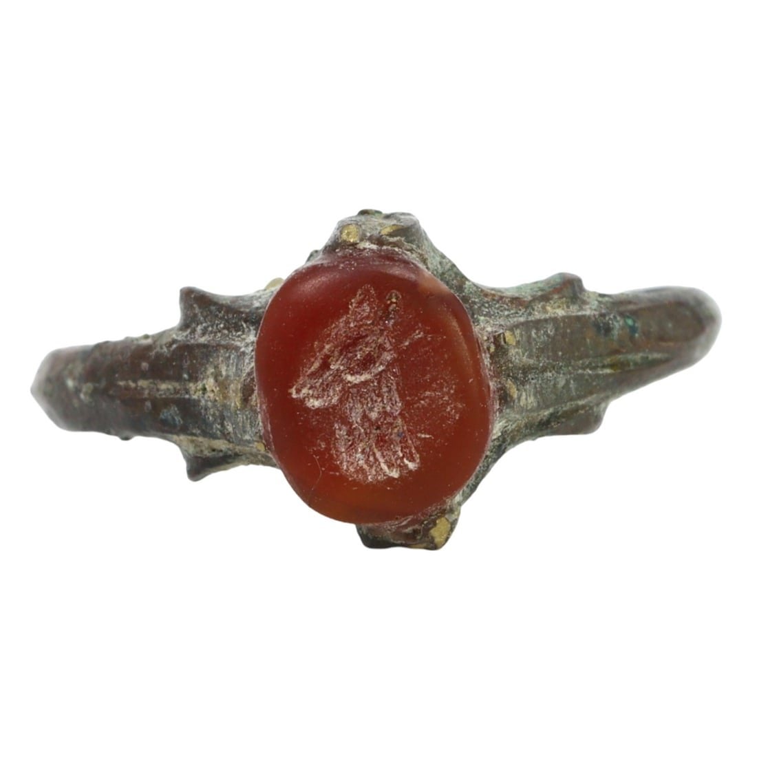 An Ancient Sasanian Carnelian Intaglio Stamp Seal Ring, c. 224-651 AD: This intaglio stamp seal ring, made from fine carnelian. Dating back to the Sasanian period (c. 224-651 AD), it exemplifies the intricate craftsmanship and cultural significance of the era. Such objec
