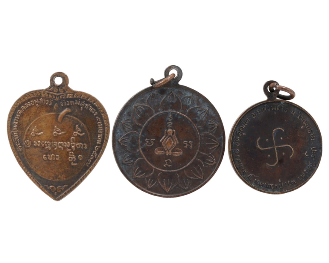 3 Antique Indo-Himalayan Medieval Period Bronze Buddhist Amulets: This set of Buddhist amulets, made from bronze, exemplifies the intricate craftsmanship and deep cultural significance of the Medieval Indo-Himalayan period. Such amulets were commonly used for spirit