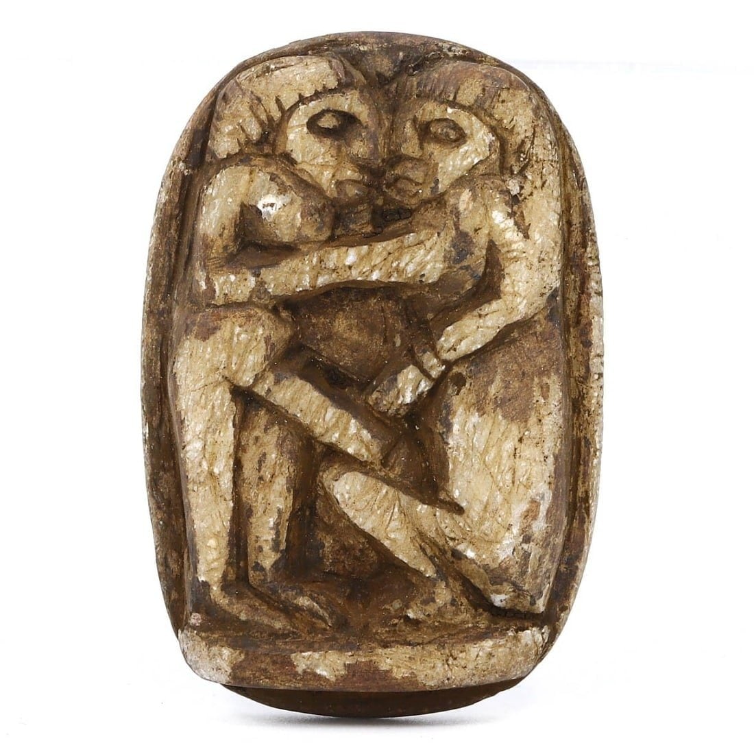 An Ancient Egyptian Steatite Carved Stamp Seal, c. 1500-1300 BCE: This steatite stamp seal, dating back to the New Kingdom period in Egypt, features intricate carvings that represent ancient Egyptian religious symbols. The detailed craftsmanship and symbolic imagery