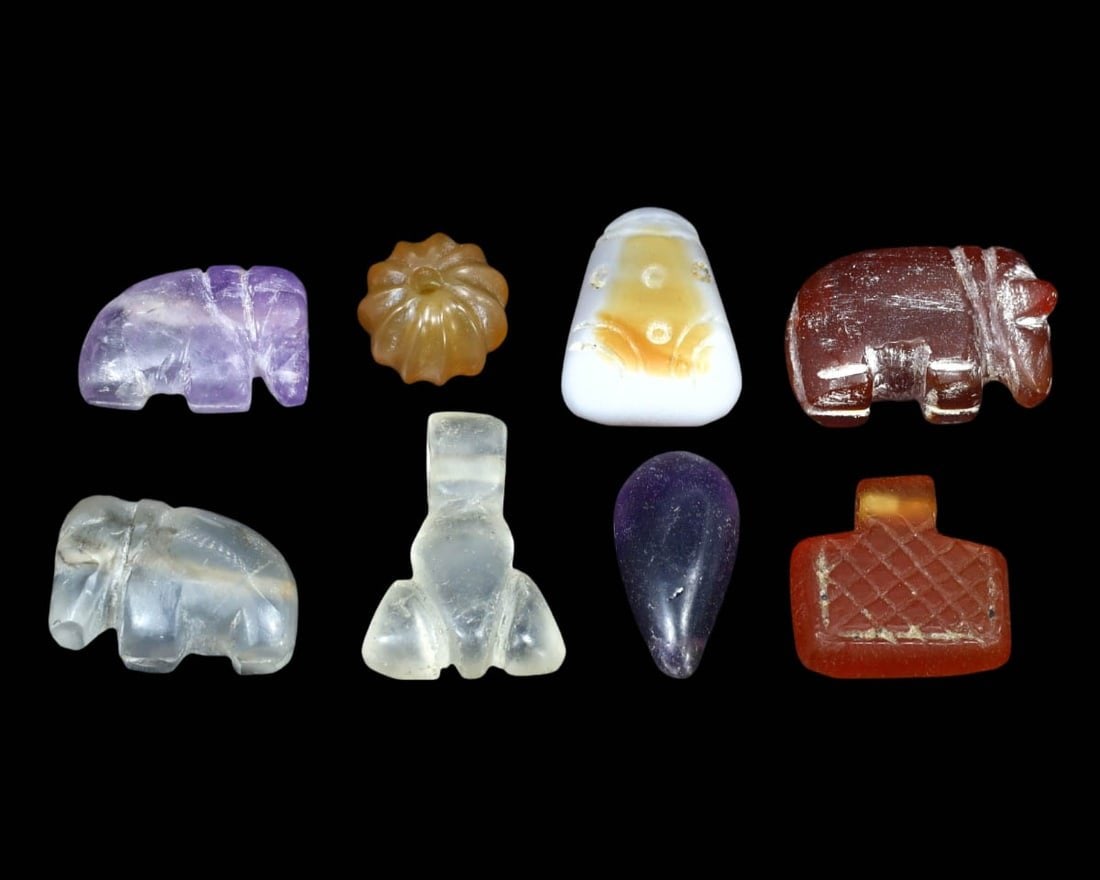 Collection of 8 Ancient Late Antique Period Coptic Egyptian Crystal and Carnelian Zoomorphic and: This collection of 8 zoomorphic and symbolic beads, made from exquisite crystal and rich carnelian, exemplifies the intricate craftsmanship and profound cultural significance of the Late Antique Perio