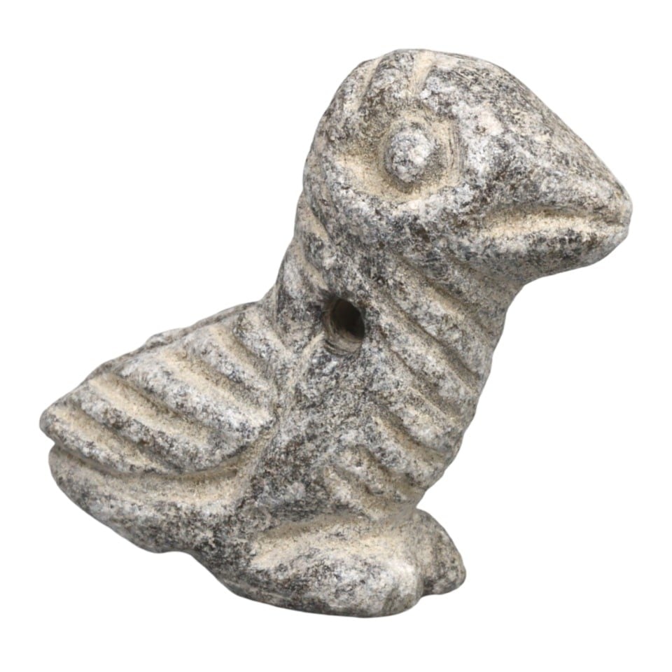Ancient Mesopotamian Sumerian Period Carved Stone Small Animal Figurine: This small animal figurine, made from expertly carved stone, exemplifies the intricate craftsmanship and profound cultural significance of Sumerian artisans in ancient Mesopotamia. Such figurines were