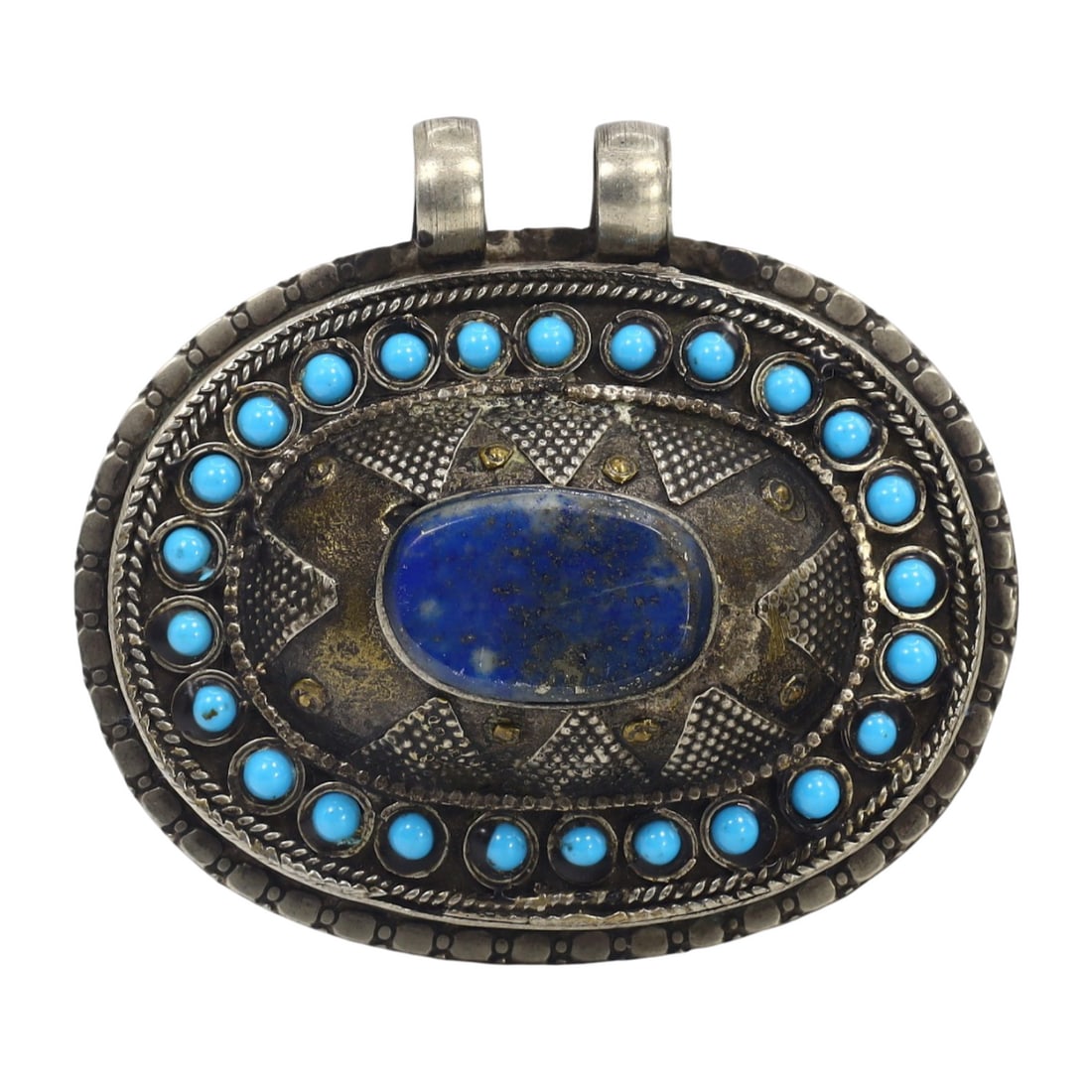 Antique Middle Eastern Period Traditional Silver and Lapis Lazuli Pendant: This silver and lapis lazuli pendant exemplifies the detailed craftsmanship and cultural significance of Middle Eastern jewelry. The pendant features a central lapis lazuli stone surrounded by turquoi