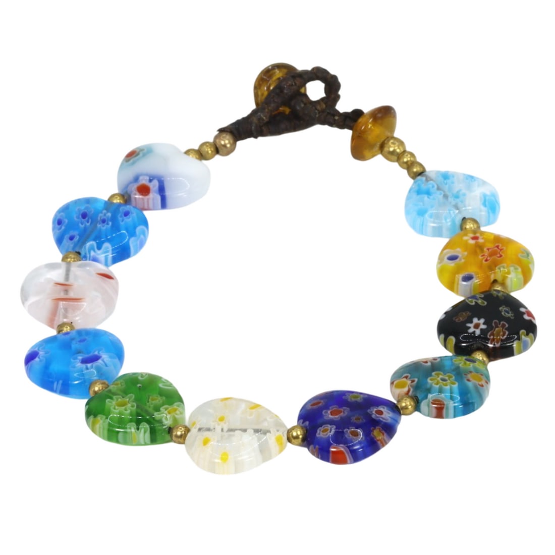 Millefiori Venetian Murano Glass Millefiori Glass Beads Bracelet: This exquisite glass beads and brass bracelet exemplifies the intricate craftsmanship and vibrant artistry of Millefiori Venetian or Murano glass. Each heart-shaped bead boasts a mesmerizing array of 