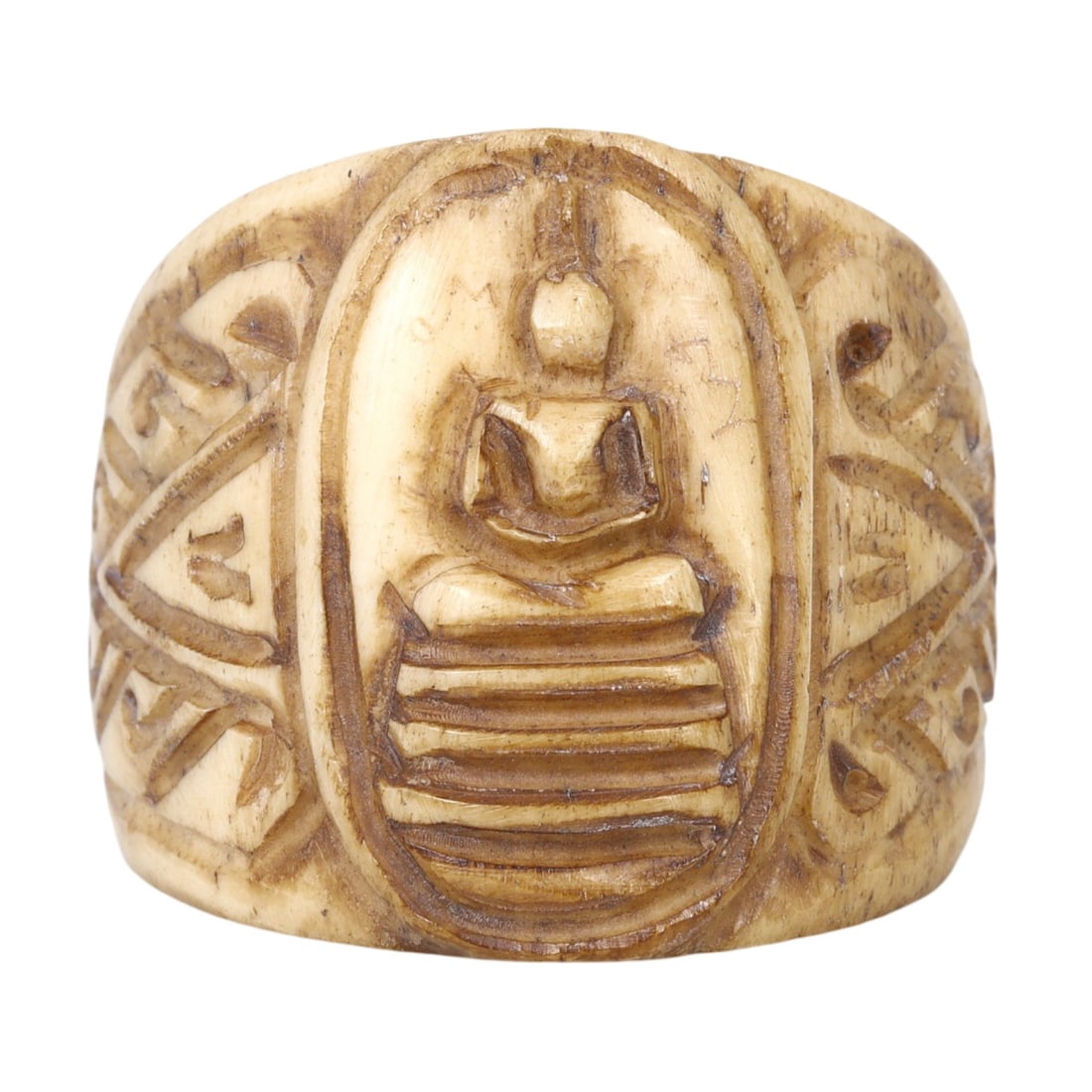 19th Century Thai Bone Ring: This bone ring exemplifies the intricate craftsmanship and profound cultural significance of 19th-century Thai artistry. The ring features a meticulous carving of the Buddha in meditation, showcasing 