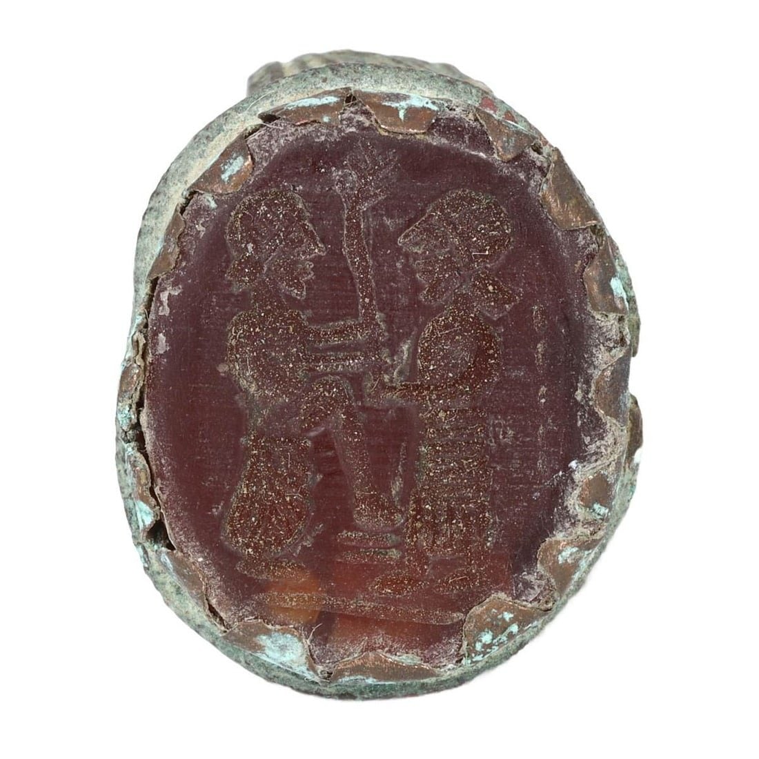 Ancient Sasanian Bronze and Carnelian Stamp Seal Ring: This bronze and carnelian stamp seal ring exemplifies the intricate craftsmanship and rich cultural significance of the ancient Sasanian Empire. The ring features an intricate design, depicting two no