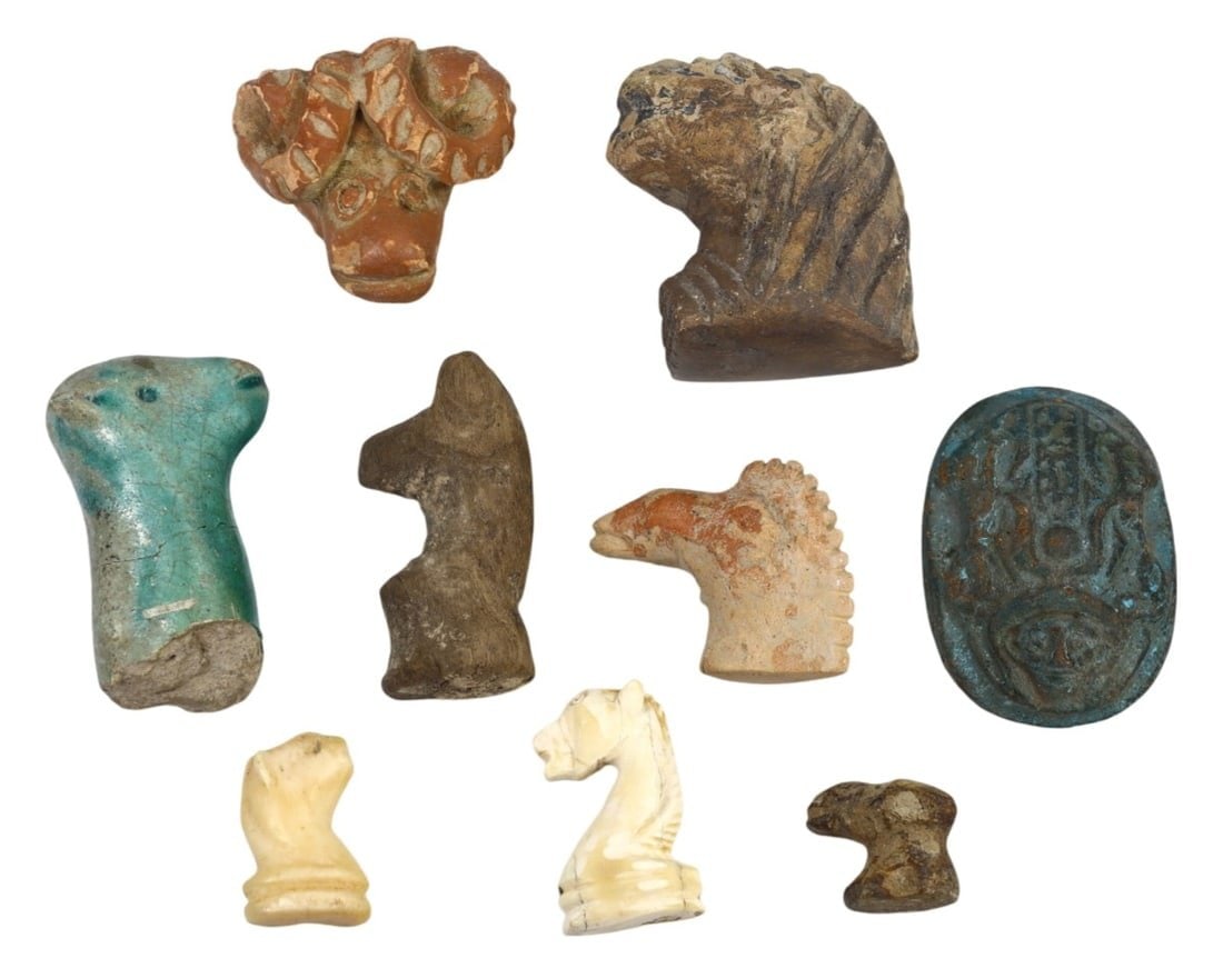 Ancient Figurative Ceramic, and Faience Animal Head Carvings: This collection of stone, ceramic, and faience animal head carvings exemplifies the high craftsmanship and cultural significance of ancient Mesopotamian, Egyptian, and Near Eastern artistry. The intri