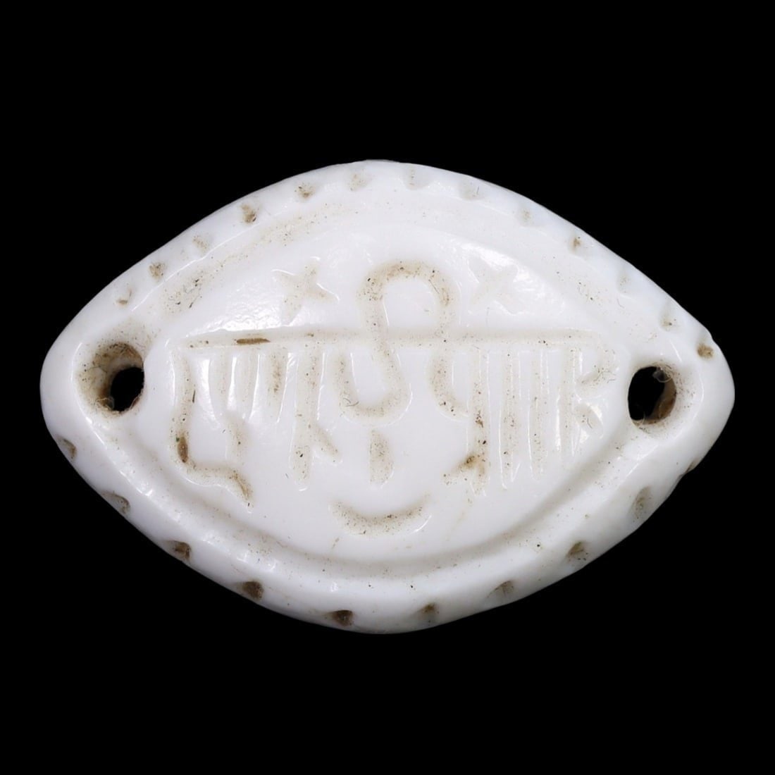 An Antique Medieval Shell Amulet with Islamic Inscription, c. 12th-14th Century: This exquisite amulet with Islamic inscription, made from a lustrous shell. Dating back to the Medieval Period (c. 12th-14th Century), it exemplifies the intricate craftsmanship and profound cultural