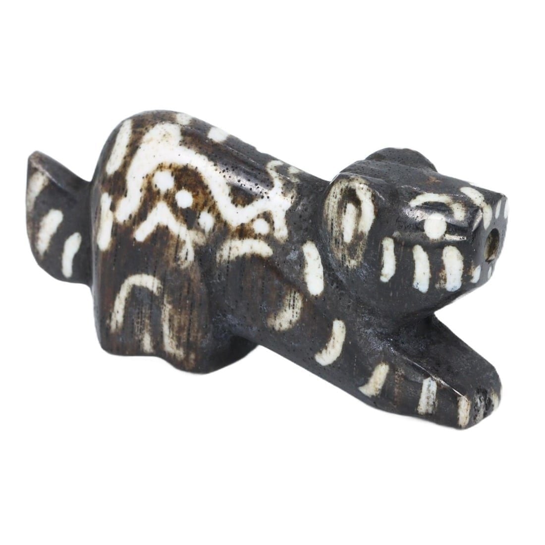 Ancient Southeast Asian Pyu Culture Zoomorphic Pumtek Amulet, c. 1st-9th Century CE: This zoomorphic amulet, reminiscent of the Pyu culture's artistic style, is thought to be made from Pumtek, a type of petrified palmwood highly valued in ancient Myanmar for its use in protective and 