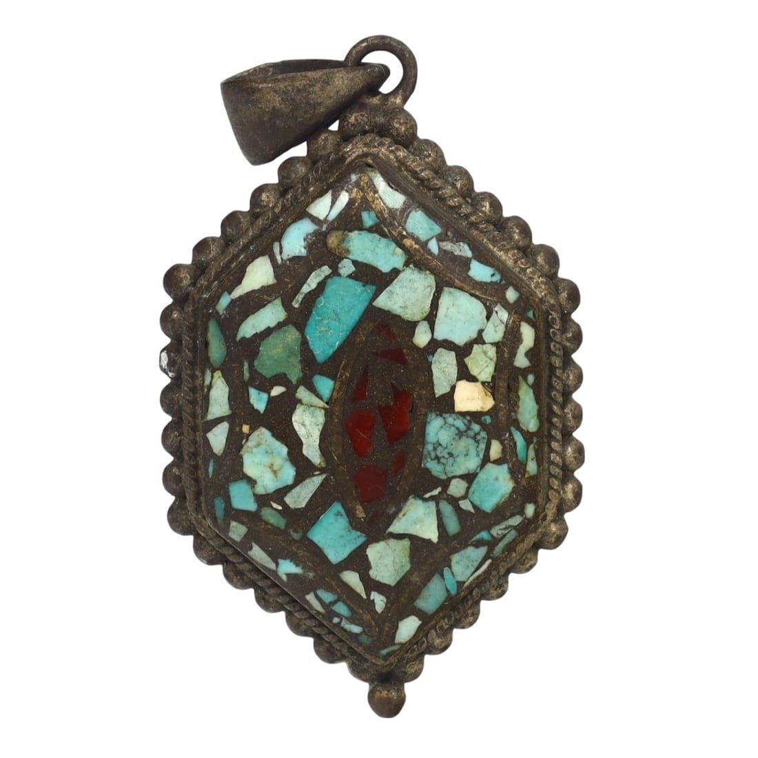 Antique Tribal Afghan Ethnic Silver Carnelian and Turquoise Pendant: This silver, carnelian and turquoise pendant exemplifies the intricate craftsmanship and cultural significance of Afghan ethnic jewelry. Pendants like this were commonly worn as amulets or decorative