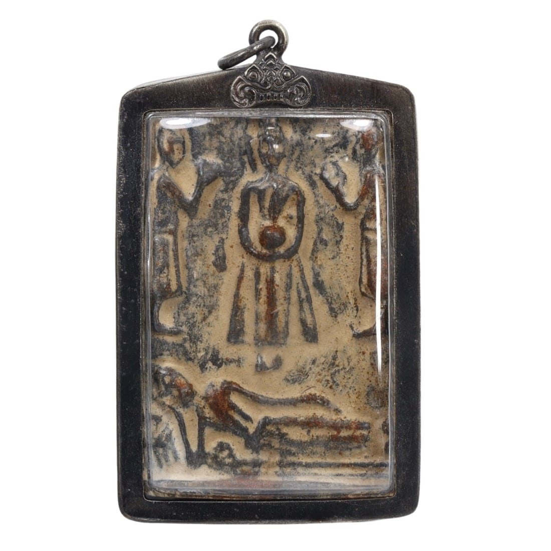 Traditional Thai Clay and Silver Pendant: This clay and silver pendant exemplifies the intricate craftsmanship and profound spiritual symbolism inherent in Traditional Thai art. Featuring a meticulously detailed relief scene, the central stan