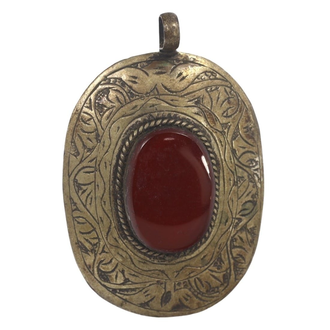 Antique Ottoman Gilt Silver and Carnelian Locket Amulet Pendant: This intricate design locket amulet pendant, made from gilt silver and centered with a striking carnelian stone. It exemplifies the exquisite craftsmanship and cultural richness of the era. Such penda
