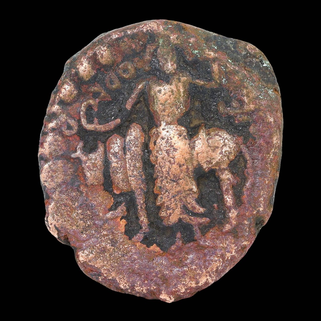Ancient Kushan Bronze Coin of Vasudeva I, Kapisa Mint, AD 190 - AD 230: This ancient Kushan bronze coin, minted during the reign of Vasudeva I, dates back to AD 190 - AD 230. Originating from the Kapisa mint, the coin measures 20x18 mm and weighs 8 grams. The obverse feat