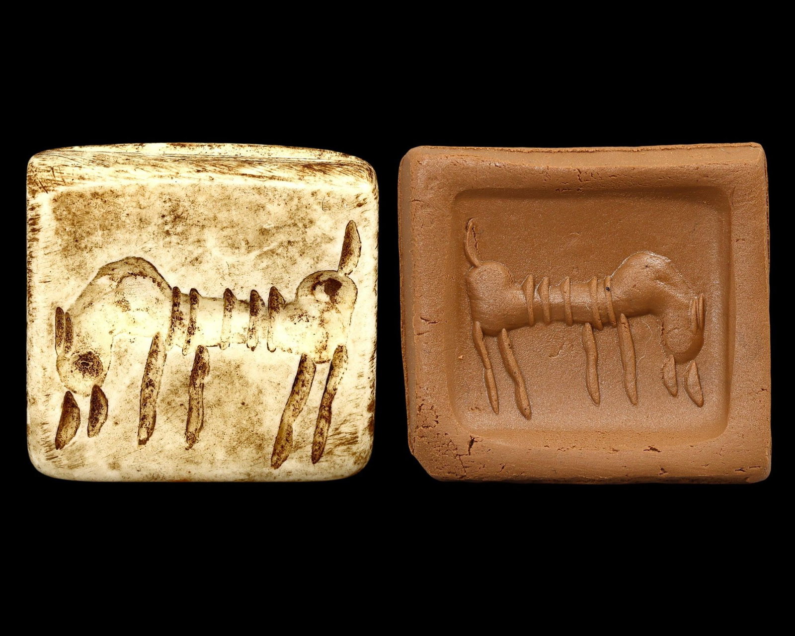 Ancient Medieval Islamic Period Dice Stamp Seal with Bovid, 9th-12th Century AD: This ancient shell dice stamp seal from Nishapur features an intricate engraving depicting either a bovid or a mythical creature. Originating from Nishapur, known for its artistic and cultural signifi
