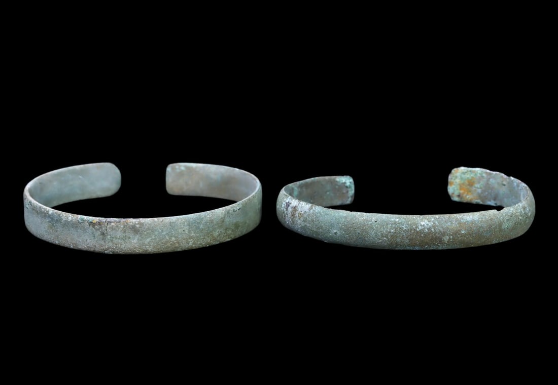 Ancient Medieval Viking Celtic Bronze Bracelet Armlet, 10th-11th Century: This medieval Viking or Celtic bronze bracelet armlet dates back to the 10th to 11th centuries AD. Crafted with intricate patterns typical of Viking and Celtic artistry, this armlet would have been wo
