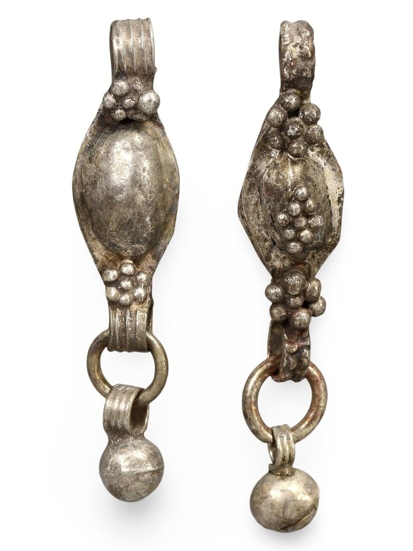 Lot of 2 Ancient Medieval Viking / Celtic Silver Pendant Ornament, 9th-11th Century: This silver pendant ornament from the Ancient Medieval period, dating back to the 9th-11th century, is a remarkable example of Viking and Celtic craftsmanship. Such pendants were often used as amulets
