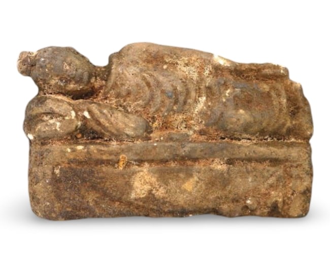 Late Medieval Tibeto-Burmese Terracotta Reclining Buddha Plaque, 14th-17th Century: This exquisite terracotta plaque depicts a reclining Buddha, a significant representation in Buddhist art symbolizing the Buddha's final moments of enlightenment before entering parinirvana. Originati