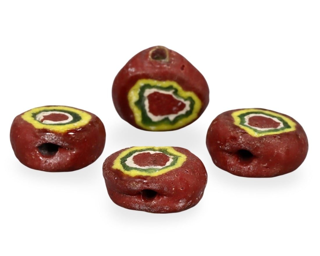 Ancient Medieval Anglo-Saxon Glass Beads with Eye Pattern, 7th-11th Century: This lot includes ancient medieval glass beads from the Anglo-Saxon period, dating between the 7th and 11th century. Each bead features an eye pattern, showcasing the distinctive artistry of Anglo-Sax