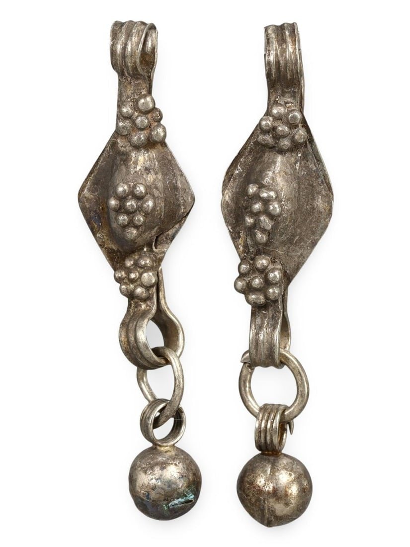 Lot of 2 Ancient Medieval Viking / Celtic Silver Pendant Ornament, 9th-11th Century: This silver pendant ornament from the Ancient Medieval period, dating back to the 9th-11th century, is a remarkable example of Viking and Celtic craftsmanship. Such pendants were often used as amulets