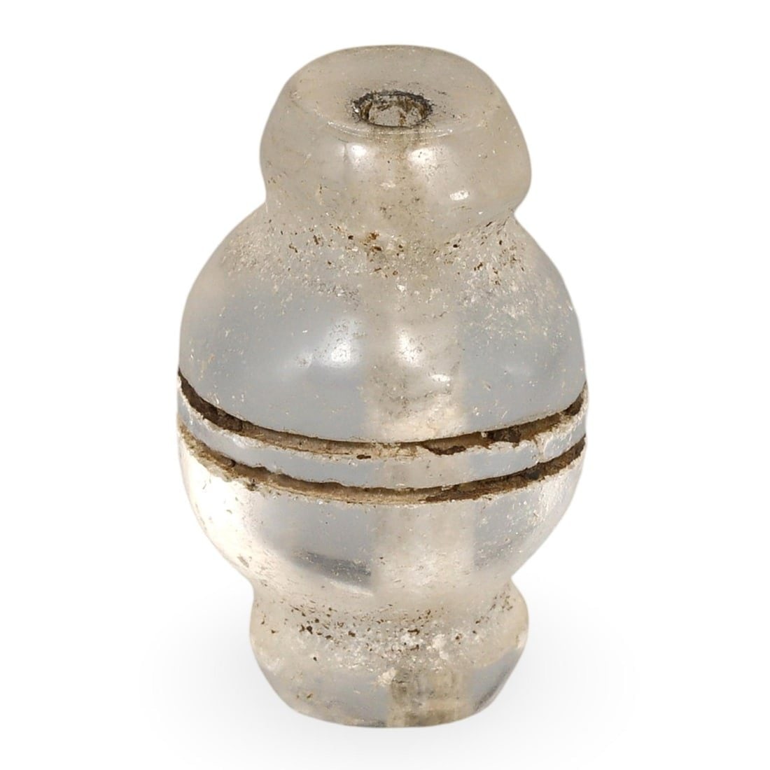 Ancient Medieval Egyptian Fatimid Carved Crystal or Glass Bead, 9th-10th Century: This exquisite bead, dating back to the 9th-10th century, hails from the Fatimid period of Medieval Egypt. Skillfully carved from crystal or glass, the bead features a unique design with intersecting 
