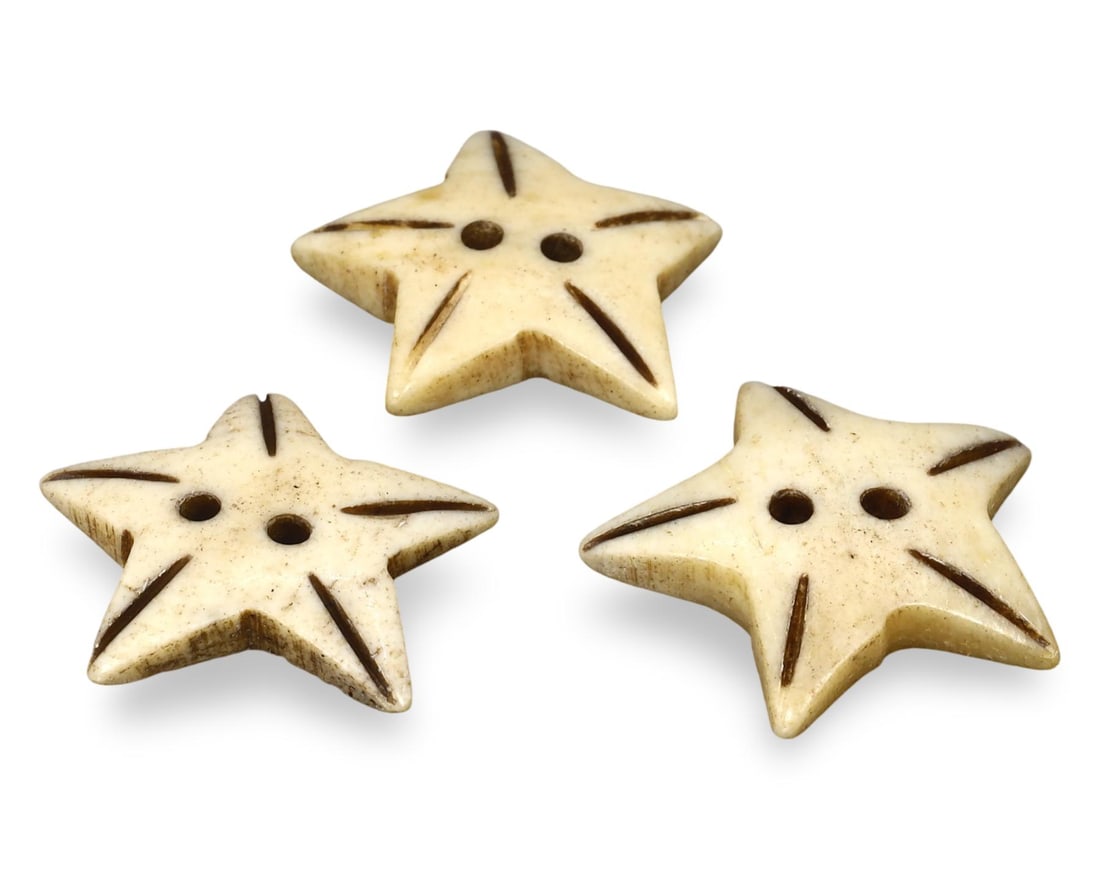 Lot of 3 Post Medieval Sino-Siberian Bone Carved Star Buttons, 20th Century: This lot features three Post Medieval Sino-Siberian Bone Carved Star Buttons from the 20th century. Each button is intricately carved from bone, showcasing a star motif with two central holes for atta