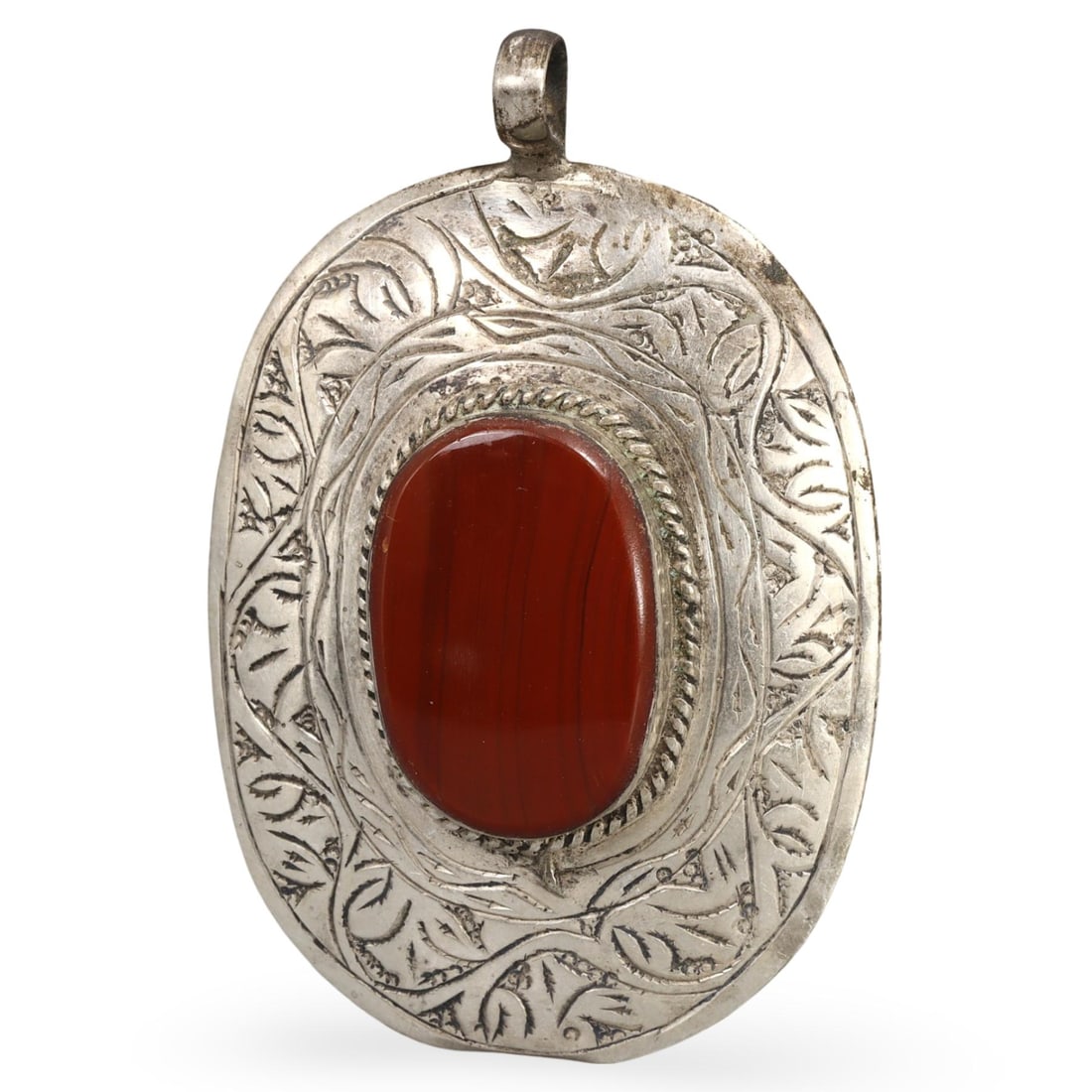 Post-Medieval Sino-Siberian / Eurasian Steppe Nomadic Tribe Silver Pendant Locket: This pendant locket from the post-medieval period originates from the Sino-Siberian or Eurasian Steppe nomadic tribes. Crafted with detailed artistry, the locket reflects the cultural and artistic inf
