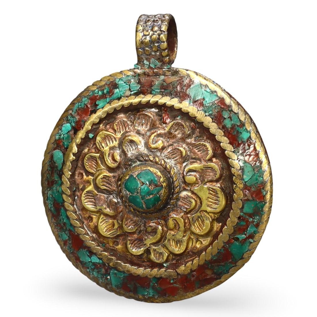 Post Medieval Sino-Tibetan Coral Turquoise Locket Amulet, 20th Century: This Post Medieval Sino-Tibetan Coral Turquoise Locket Amulet, from the 20th century, is a stunning example of traditional Tibetan craftsmanship. The locket is intricately designed with inlaid coral a