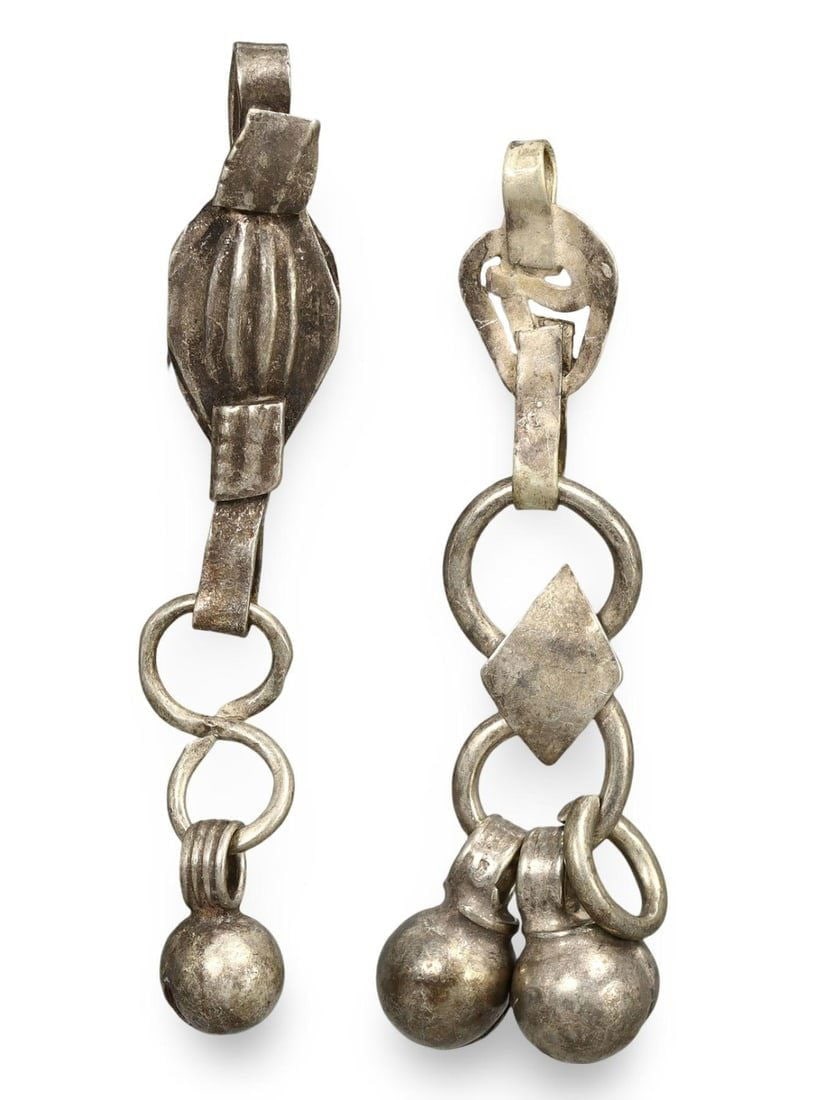 Lot of 2 Ancient Medieval Viking / Celtic Silver Pendant Ornament, 9th-11th Century: This silver pendant ornament from the Ancient Medieval period, dating back to the 9th-11th century, is a remarkable example of Viking and Celtic craftsmanship. Such pendants were often used as amulets