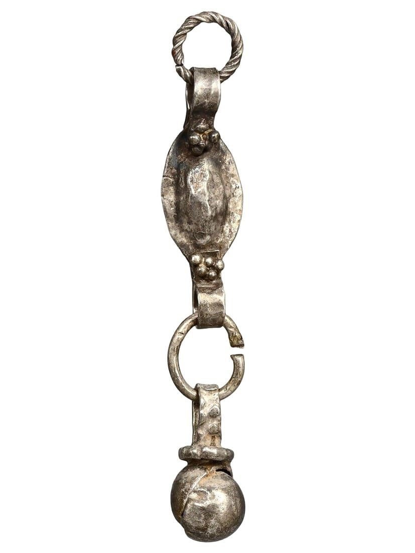 Ancient Medieval Viking / Celtic Silver Pendant Ornament, 9th-11th Century: This silver pendant ornament from the Ancient Medieval period, dating back to the 9th-11th century, is a remarkable example of Viking and Celtic craftsmanship. Such pendants were often used as amulets
