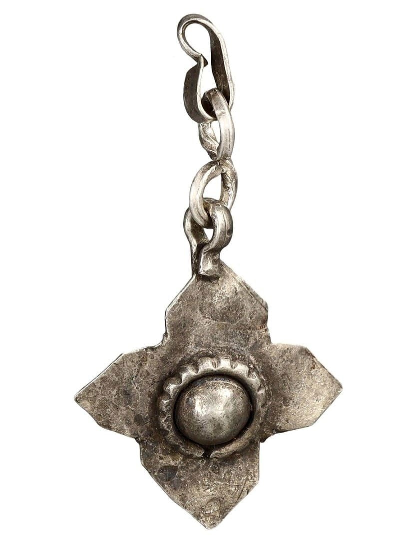 Ancient Medieval Viking / Celtic Silver Pendant Ornament, 9th-11th Century: This silver pendant ornament from the Ancient Medieval period, dating back to the 9th-11th century, is a remarkable example of Viking and Celtic craftsmanship. Such pendants were often used as amulets