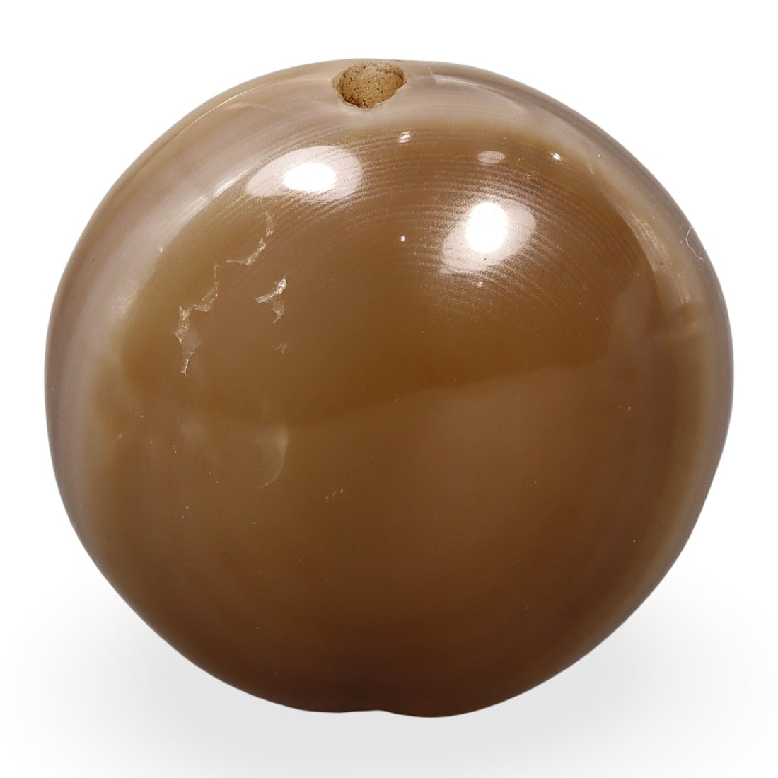 Post Medieval Sino-Tibetan Agate Luk Mik Goat Eye Bead, 18th-20th Century: This Post Medieval Sino-Tibetan Agate Luk Mik Goat Eye Bead, dating from the 18th-20th century, is an exquisite example of traditional Tibetan craftsmanship. The bead, made from agate, features a dist