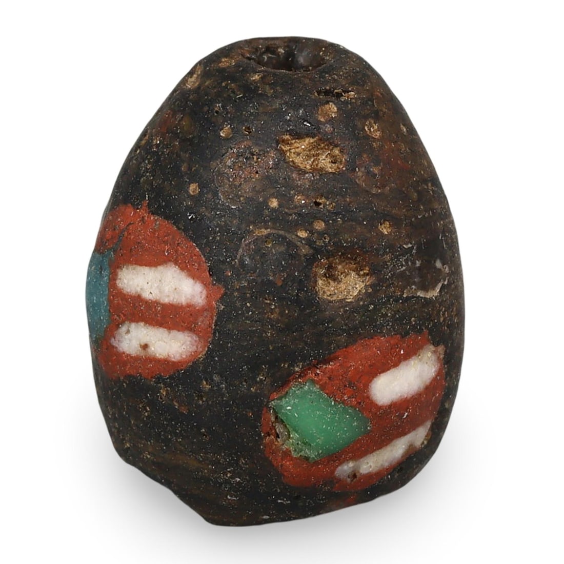 Ancient Early Medieval Viking Glass Bead, 8th-11th Century: This ancient glass bead dates back to the Early Medieval period, specifically between the 8th and 11th centuries, a time known for Viking exploration and craftsmanship. The bead is made of dark glass 