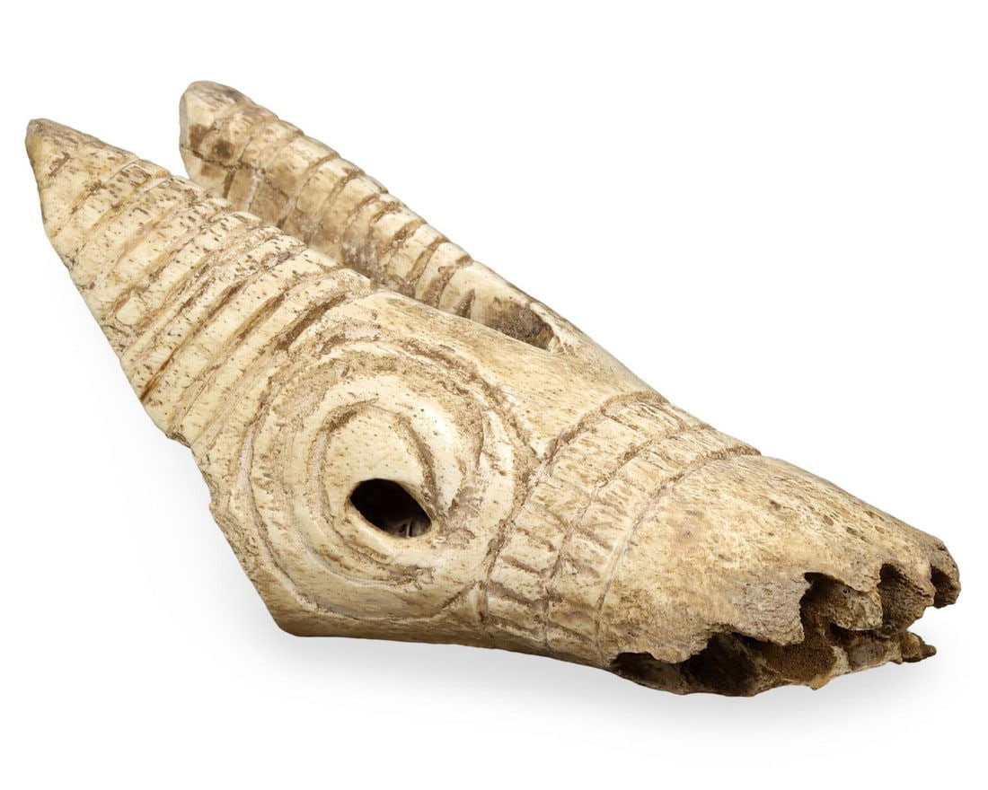 Ancient Byzantine Bone Zoomorphic Head Sculpture, 4th-7th Century CE: This remarkable bone sculpture dates back to the Byzantine period, between the 4th and 7th centuries CE. Expertly carved, the piece represents a zoomorphic head, showcasing the intricate artistry and 