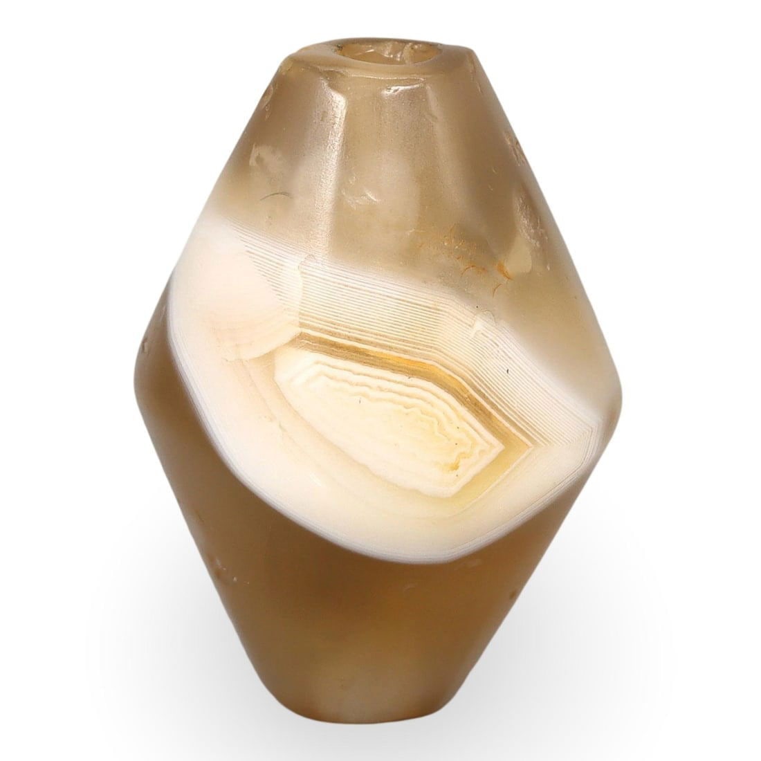 Ancient Early Medieval Sino-Siberian Bicone Agate Bead, 5th-10th Century: This Ancient Early Medieval Sino-Siberian bead, dating from the 5th-10th century, is expertly crafted from agate into a distinctive bicone shape. The bead exhibits a smooth, polished surface with natu