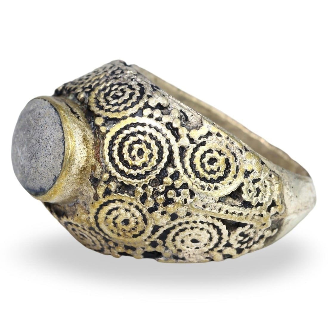 Antique Post Medieval Period Nomadic Silver Ring with Filigree Design US 7.5, 19th Century: This exquisite 19th-century silver ring is a remarkable example of nomadic craftsmanship. The ring features an intricate filigree design, created using delicate silver wire. The cast ring showcases th