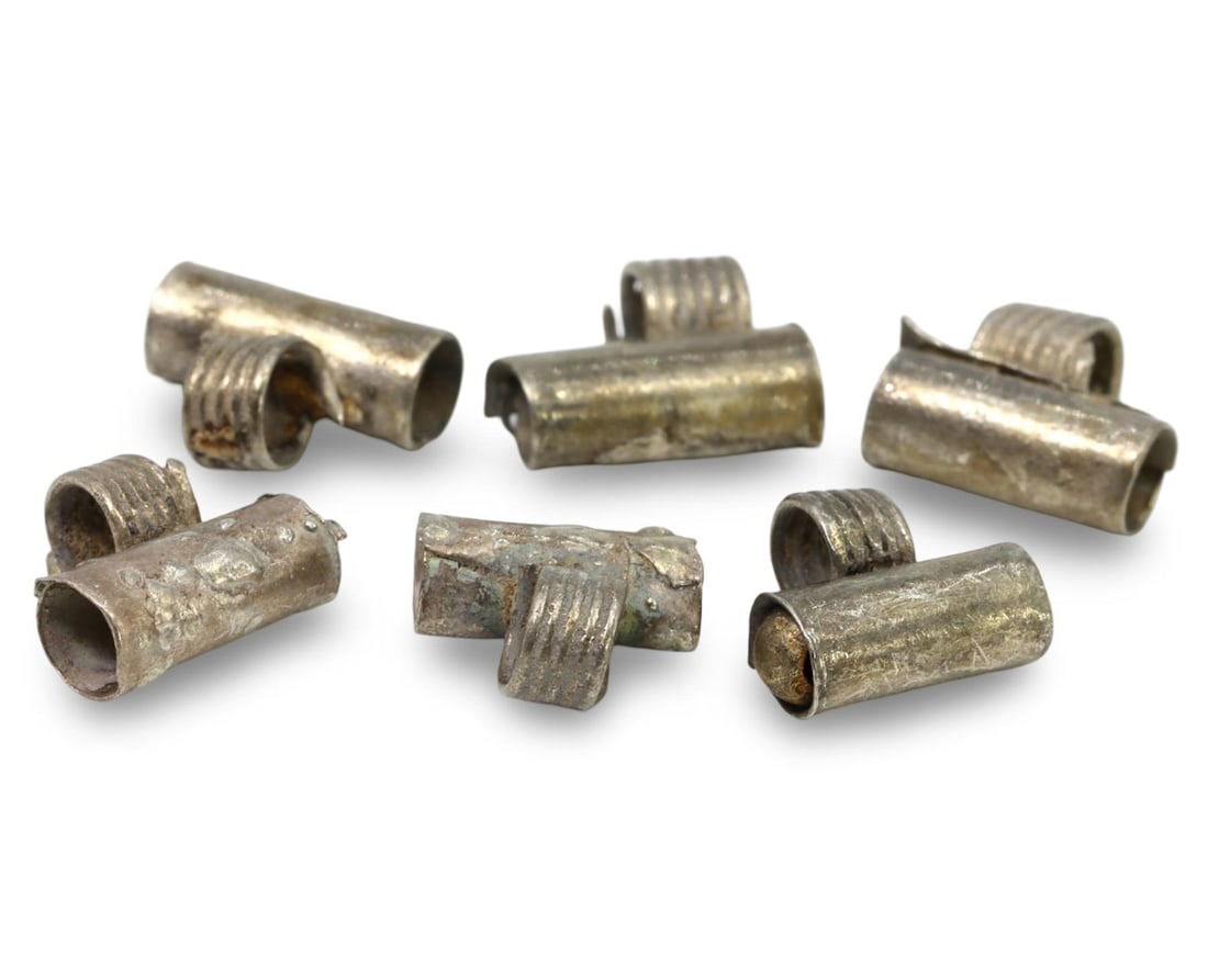 Lot of 6 Medieval Viking Period Ancient Silver Jewelry Beads, 10th-13th Century: This lot consists of ancient silver jewelry beads from the Medieval Viking period, dating between the 10th and 13th centuries. These beads exemplify the intricate craftsmanship and artistic sensibilit