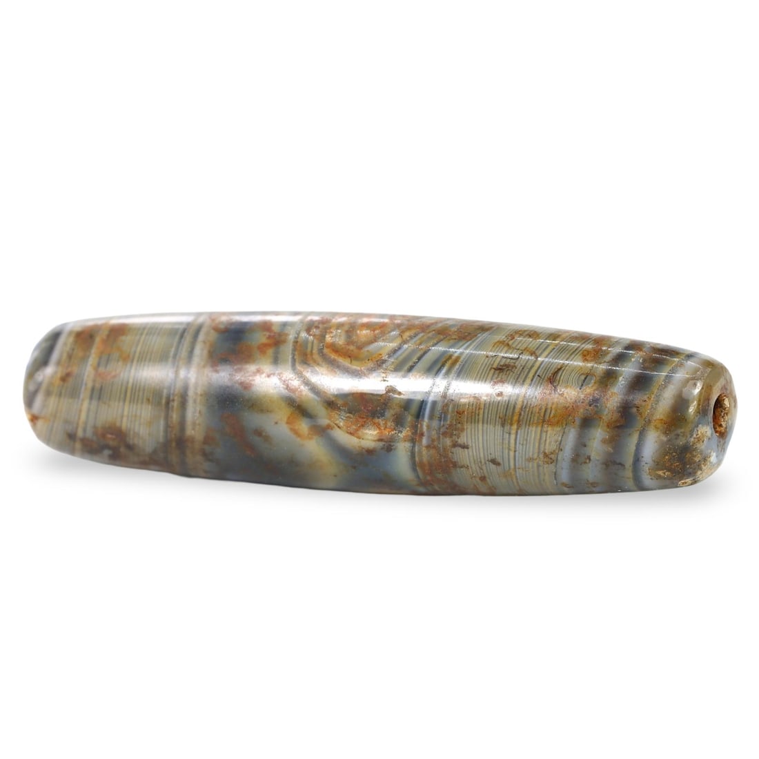 Post Medieval Tibeto-Burmese Banded Agate Chung dZi Bead, 17th-20th Century: This Post Medieval Tibeto-Burmese Banded Agate Chung dZi Bead, dating from the 17th-20th Century, offers a unique glimpse into the spiritual and cultural practices of the Tibeto-Burmese region. The be