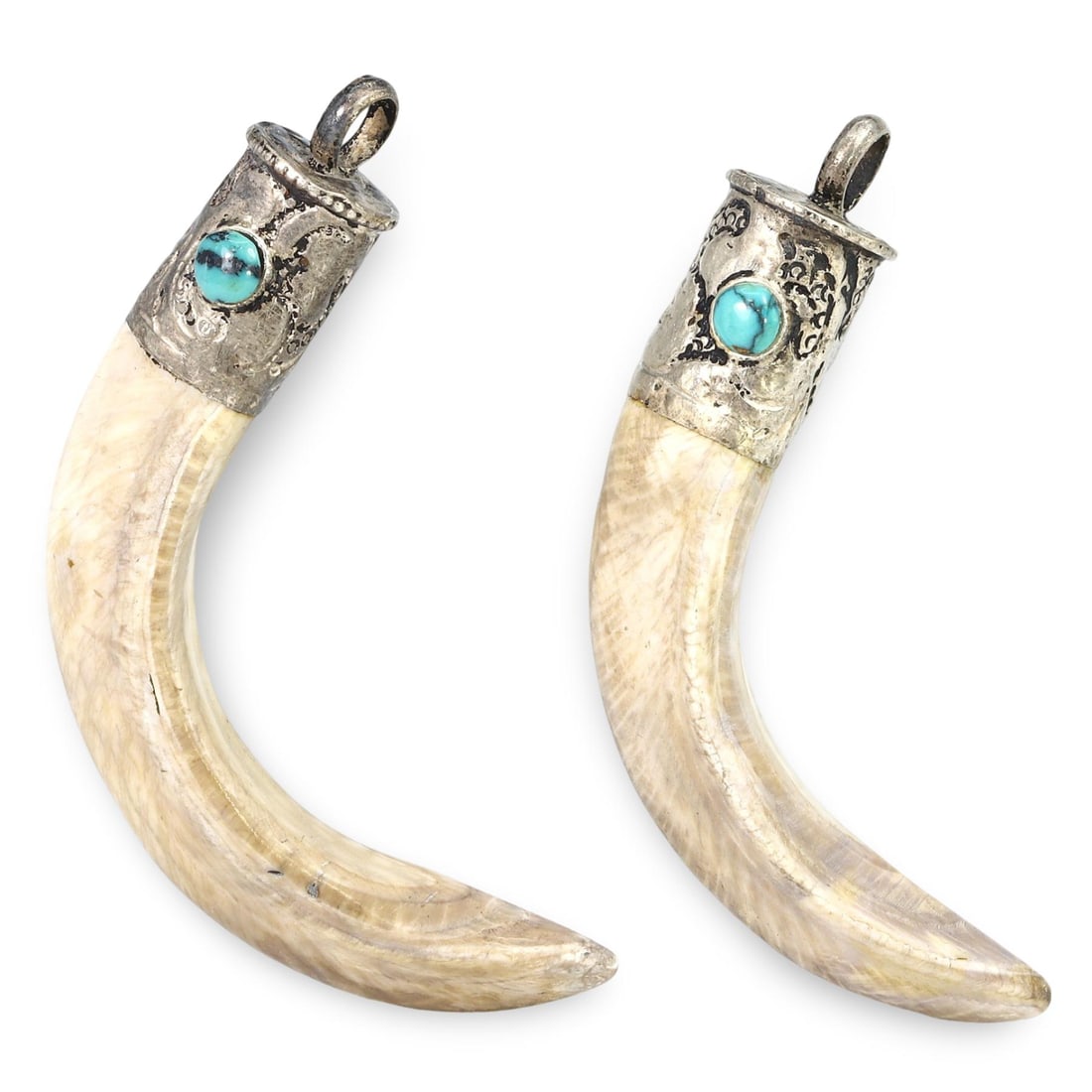 Post Medieval Sino-Tibetan Tusk Amulet Pendants, 17th-20th Century: These Post Medieval Sino-Tibetan Tusk Amulet Pendants, dating from the 17th to the 20th century, feature intricately crafted tusks capped with finely detailed silver settings adorned with turquoise st