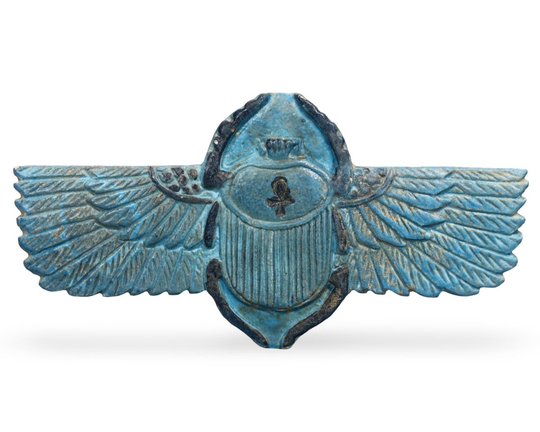 4.9" Post Medieval Egyptian Grand Tour Winged Scarab Amulet, 17th-20th Century: This 4.9-inch winged scarab amulet, dating from the 17th-20th century, is a fine example of Post Medieval Egyptian Grand Tour craftsmanship. The amulet showcases the iconic winged scarab, a symbol of 