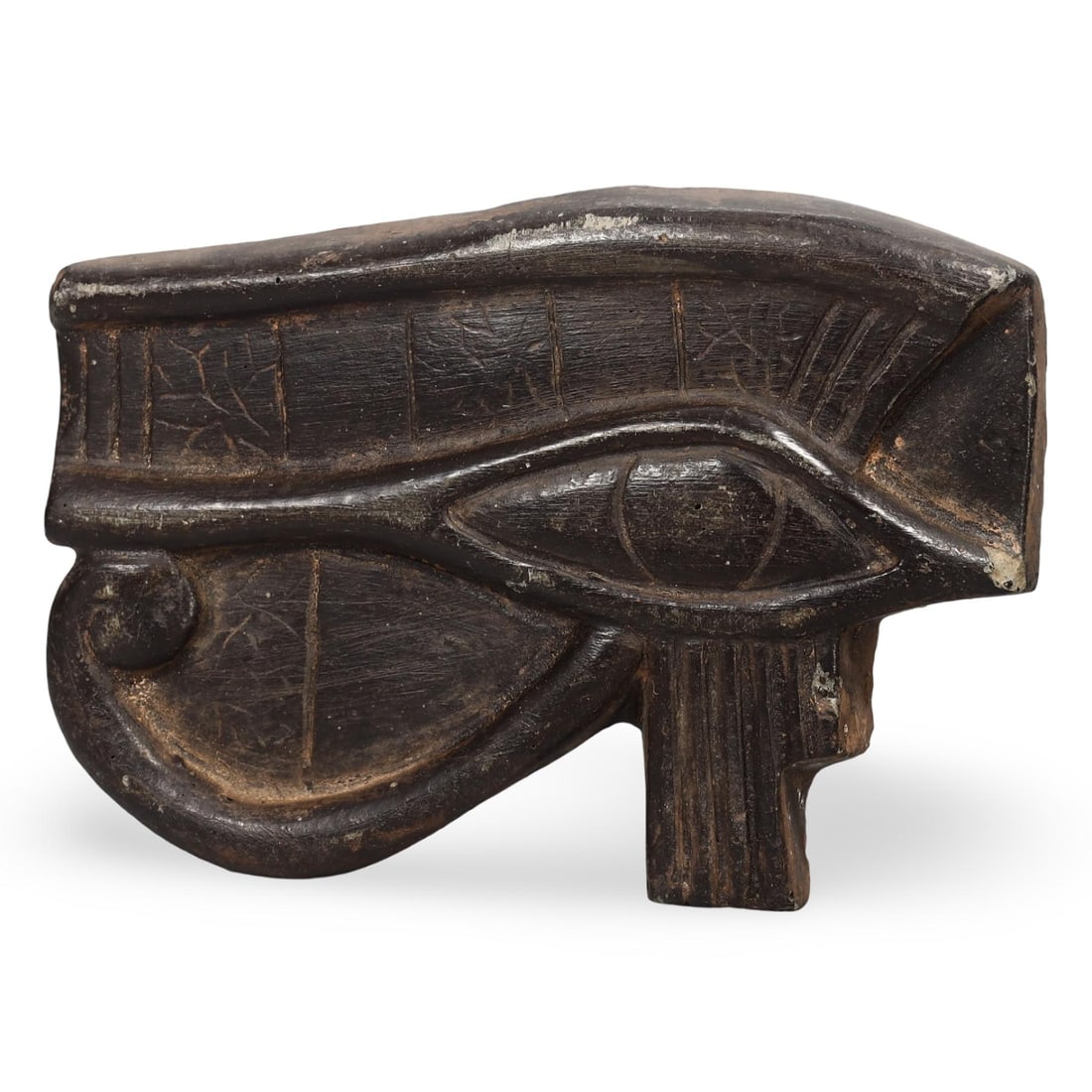 4.5" Post Medieval Egyptian Grand Tour Eye Amulet, 17th-20th Century: This 4.5-inch Eye Amulet, dating from the 17th to the 20th century, offers a unique glimpse into the fascination with ancient Egyptian culture during the Grand Tour period. The amulet features the ico