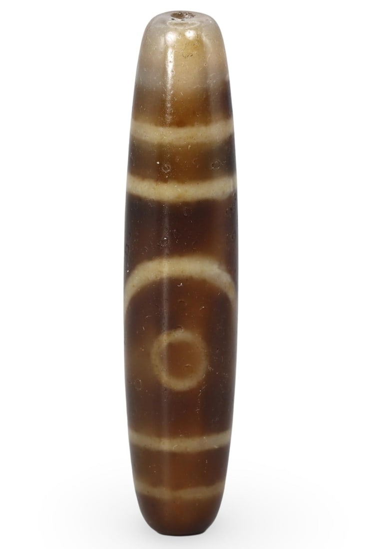 Antique Sino-Tibetan Agate Dzi Bead: [No Reserve] Hi everyone, I am Mark, curating this special World’s Beads Treasure Hunt for UNICEF. Every lot starts at just $15 with no reserve, no matter the cost. You determine the final price! We