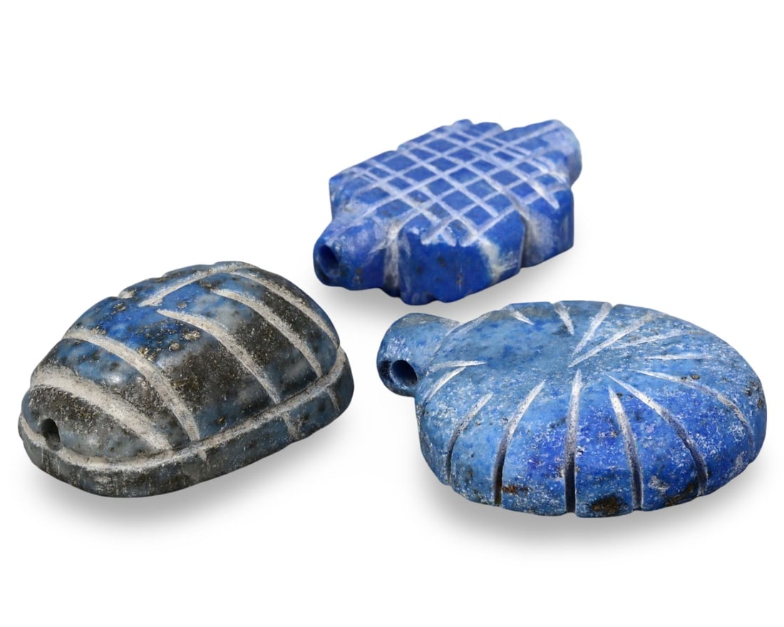 Antique Coptic Byzantine Egyptian Carved Lapis Lazuli Pillar Amulets: [No Reserve] Hi everyone, I am Mark, curating this special World's Beads Treasure Hunt for UNICEF. Every lot starts at just 15 with no reserve, no matter the cost. You determine the final price! We've