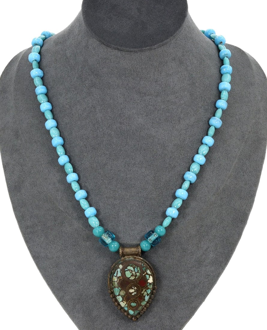 Vintage Sino-Tibetan Turquoise Blue Beads and Tribal Pendant Necklace: [No Reserve] Hi everyone, I am Mark, curating this special World's Beads Treasure Hunt for UNICEF. Every lot starts at just 15 with no reserve, no matter the cost. You determine the final price! We've