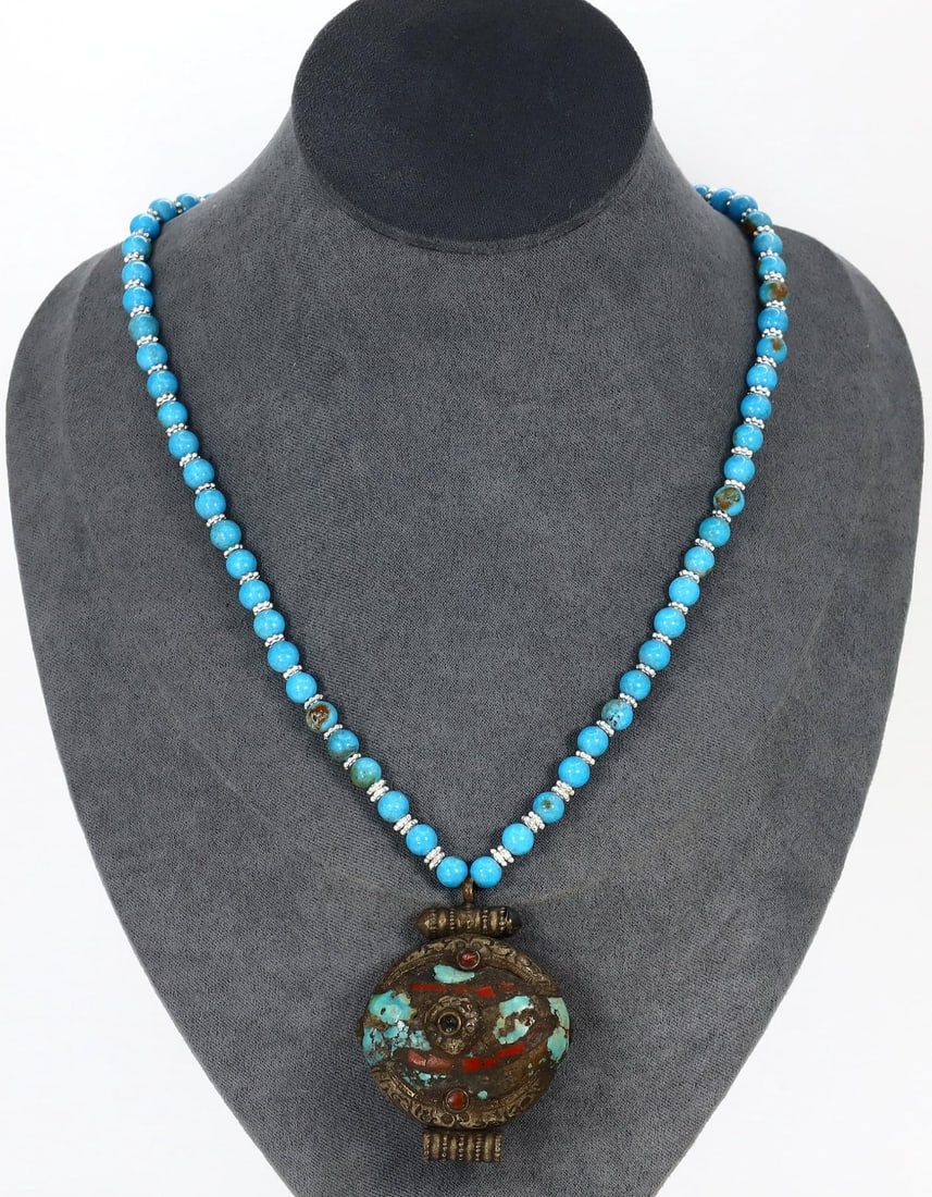 Vintage Sino-Tibetan Turquoise Blue Beads and Tribal Pendant Necklace: [No Reserve] Hi everyone, I am Mark, curating this special World's Beads Treasure Hunt for UNICEF. Every lot starts at just 15 with no reserve, no matter the cost. You determine the final price! We've