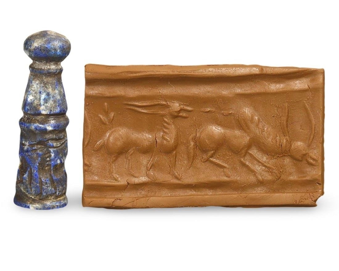 Ancient Achaemenid Lapis Lazuli Cylinder Seal with Ibex Motif, c. 550-330 BCE: [No Reserve] Welcome to Auction 28 - Classical Medieval Coins & Relics! This exclusive event showcases an extraordinary collection of classical coins and authentic Viking to Medieval bronze jewelry. O