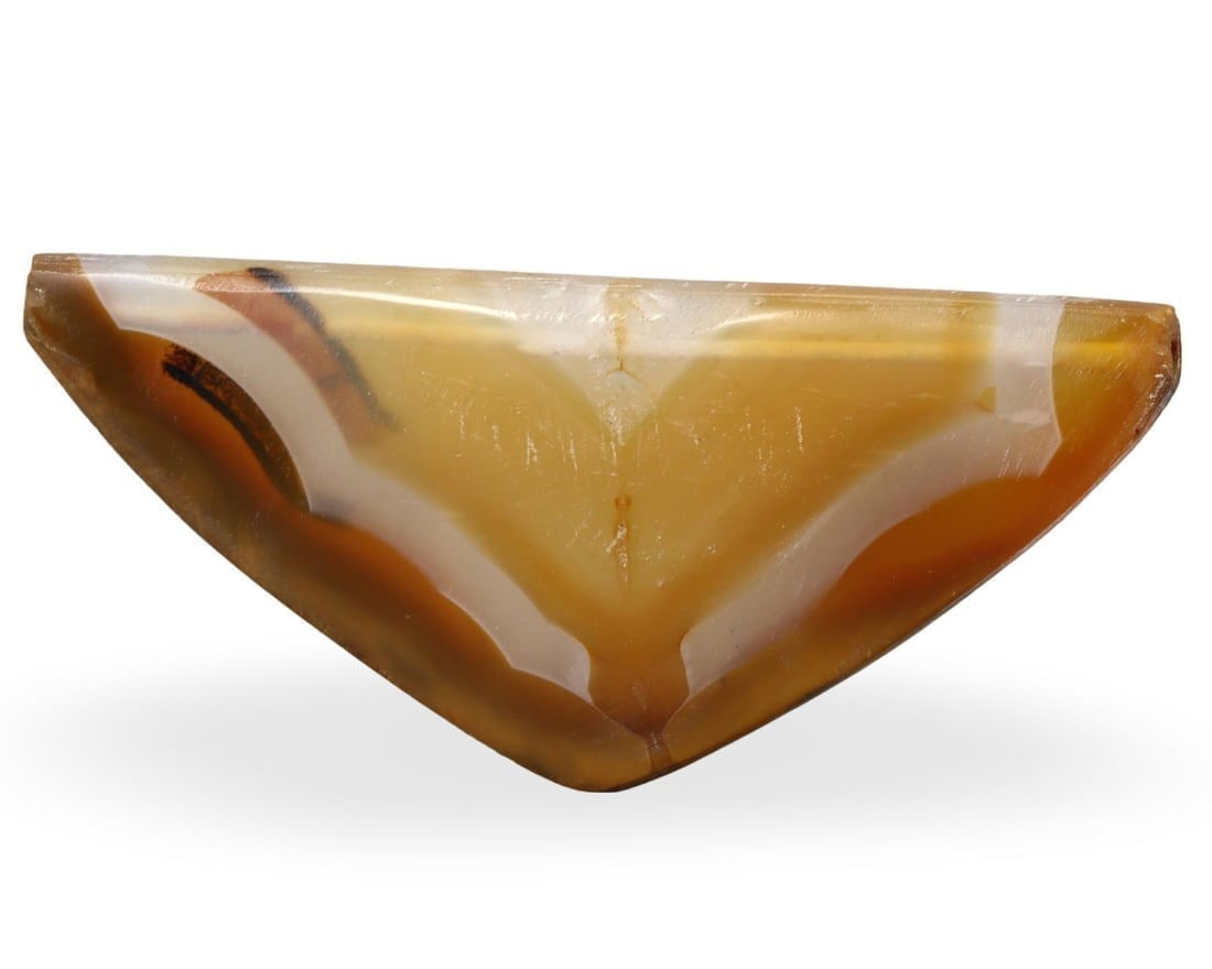 Ancient Late Medieval Eurasian Steppe Carnelian Bow Amulet Bead, 14th-15th Century: We are delighted to present an extraordinary collection of jewelry and artifacts spanning various historic European periods. Our selection ranges from Ancient Roman, Byzantine, and Early Medieval to L