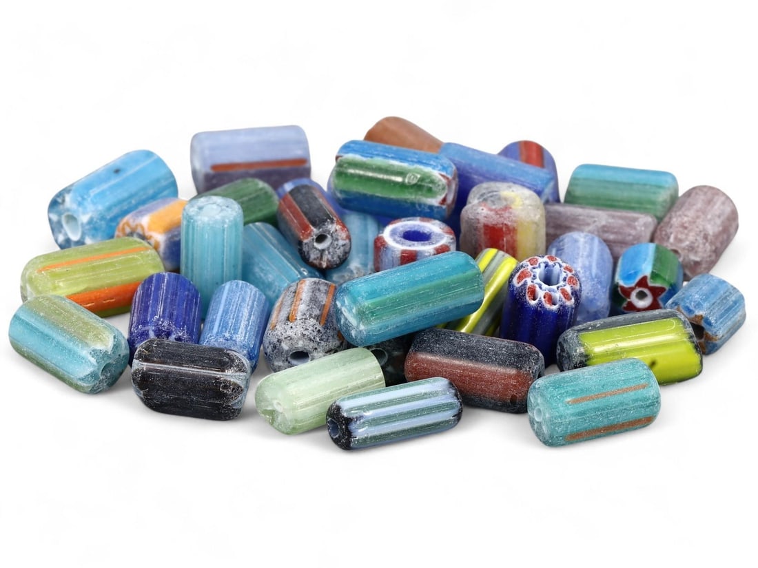 Lot of Antique Multi-Color Chevron Glass Trade Beads: We are delighted to present an extraordinary collection of jewelry and artifacts spanning various historic European periods. Our selection ranges from Ancient Roman, Byzantine, and Early Medieval to L
