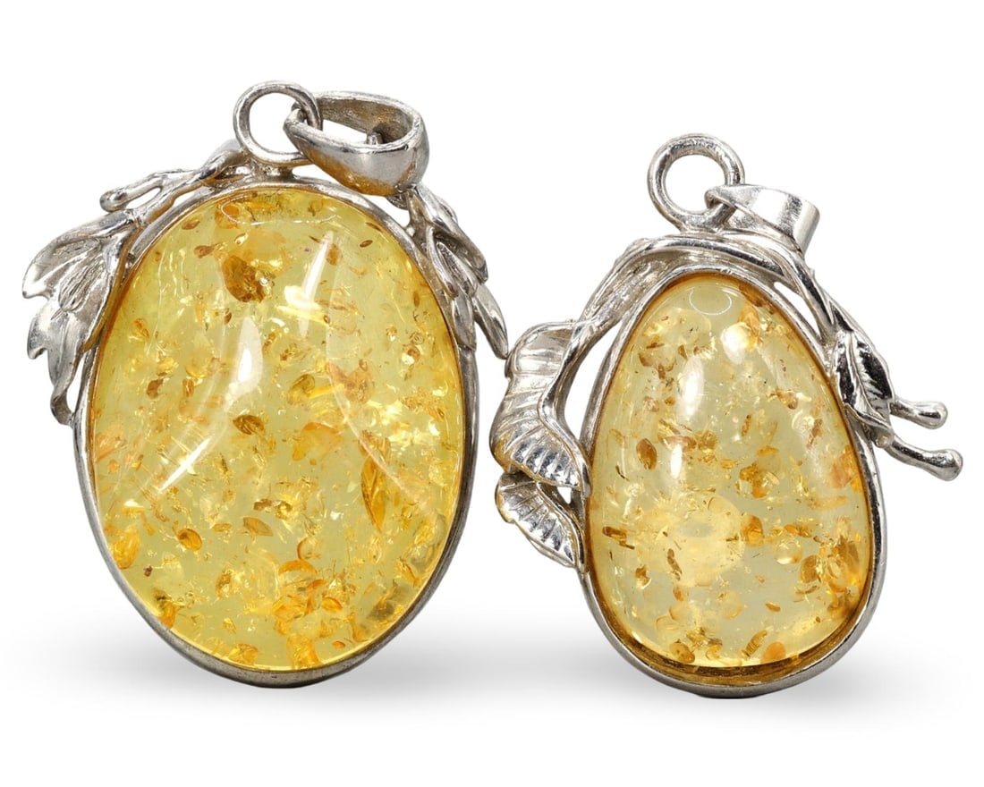 Modern European Baltic Pressed Amber Silver Pendants: We are delighted to present an extraordinary collection of jewelry and artifacts spanning various historic European periods. Our selection ranges from Ancient Roman, Byzantine, and Early Medieval to L
